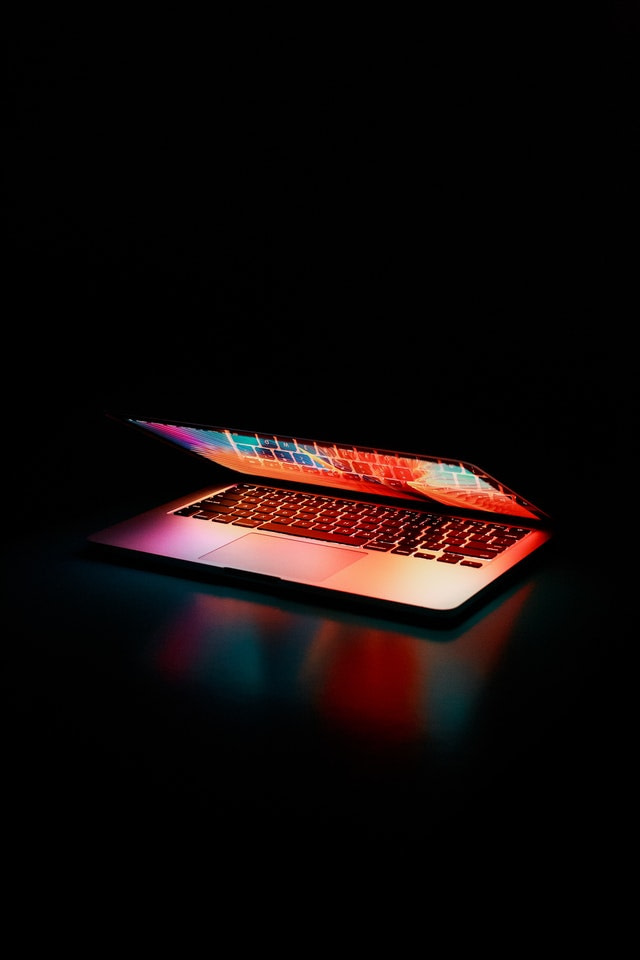 semi-opened-laptop-computer-turned-on-on-table-2047905 (1)