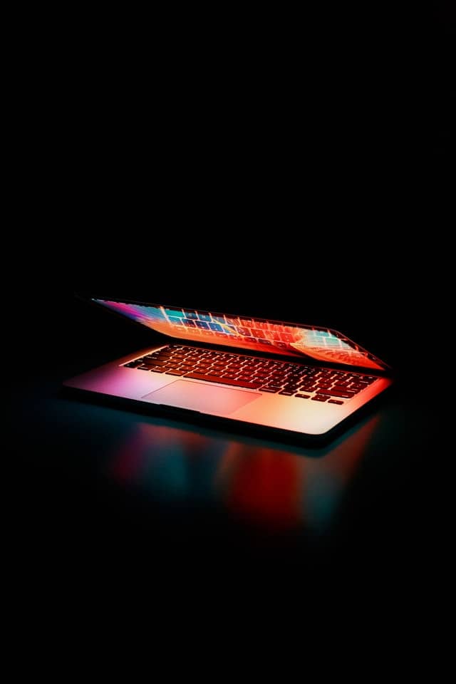 semi-opened-laptop-computer-turned-on-on-table-2047905 (1)